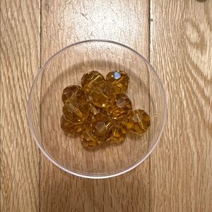 Transparent Amber colored faceted glass beads - qty 12